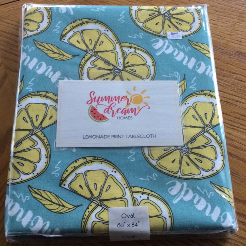 Lemonade table cloth by Summer Dream. 60X84” oval. Carefree polyester